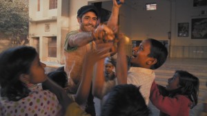 Open yourself up to people. Sean Fletcher, a lead character of the multi-award winning film 'Reconnection' with children at Sundipani Muni charitable school in Vrindavan, India. A still from the film.